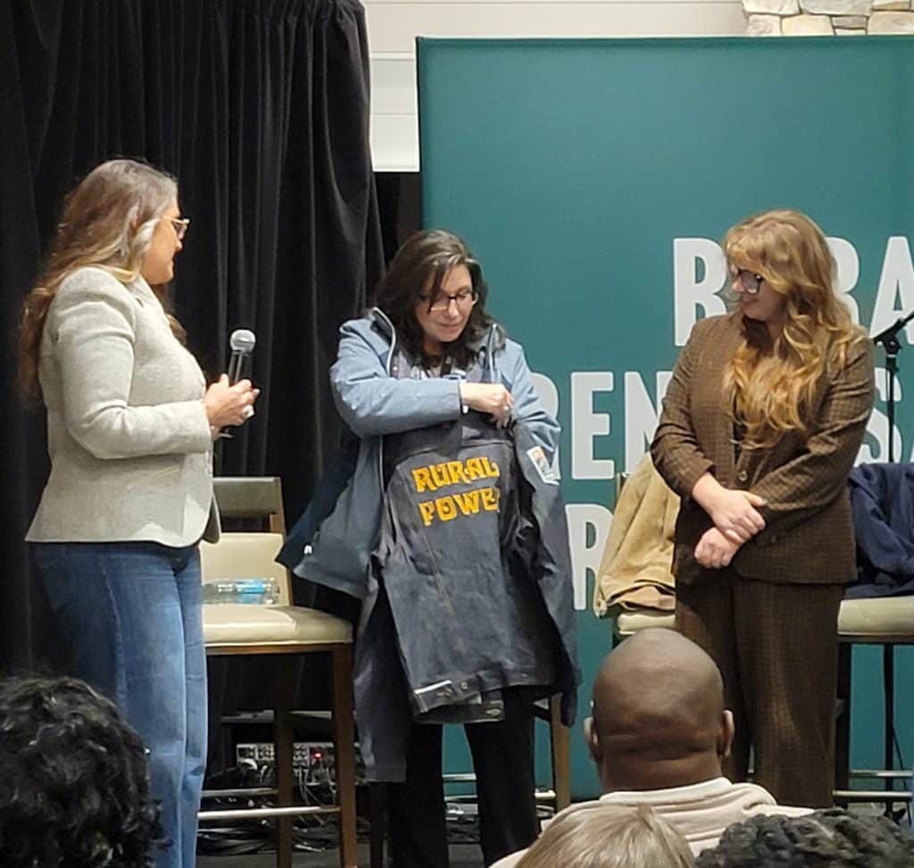 Tracy O’Neill accepts the Rural Power Champion Award on Nov. 10, 2025.